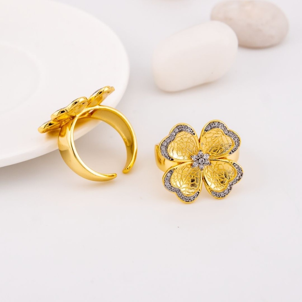 Anillo ajustable en forma de flor con zirconias baño 18k