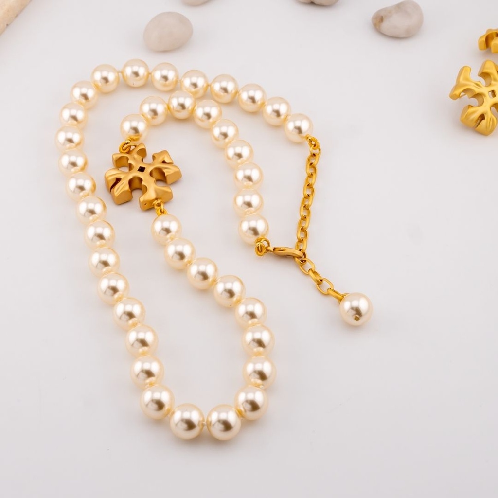 Collar de marca T con perla shell baño 18k