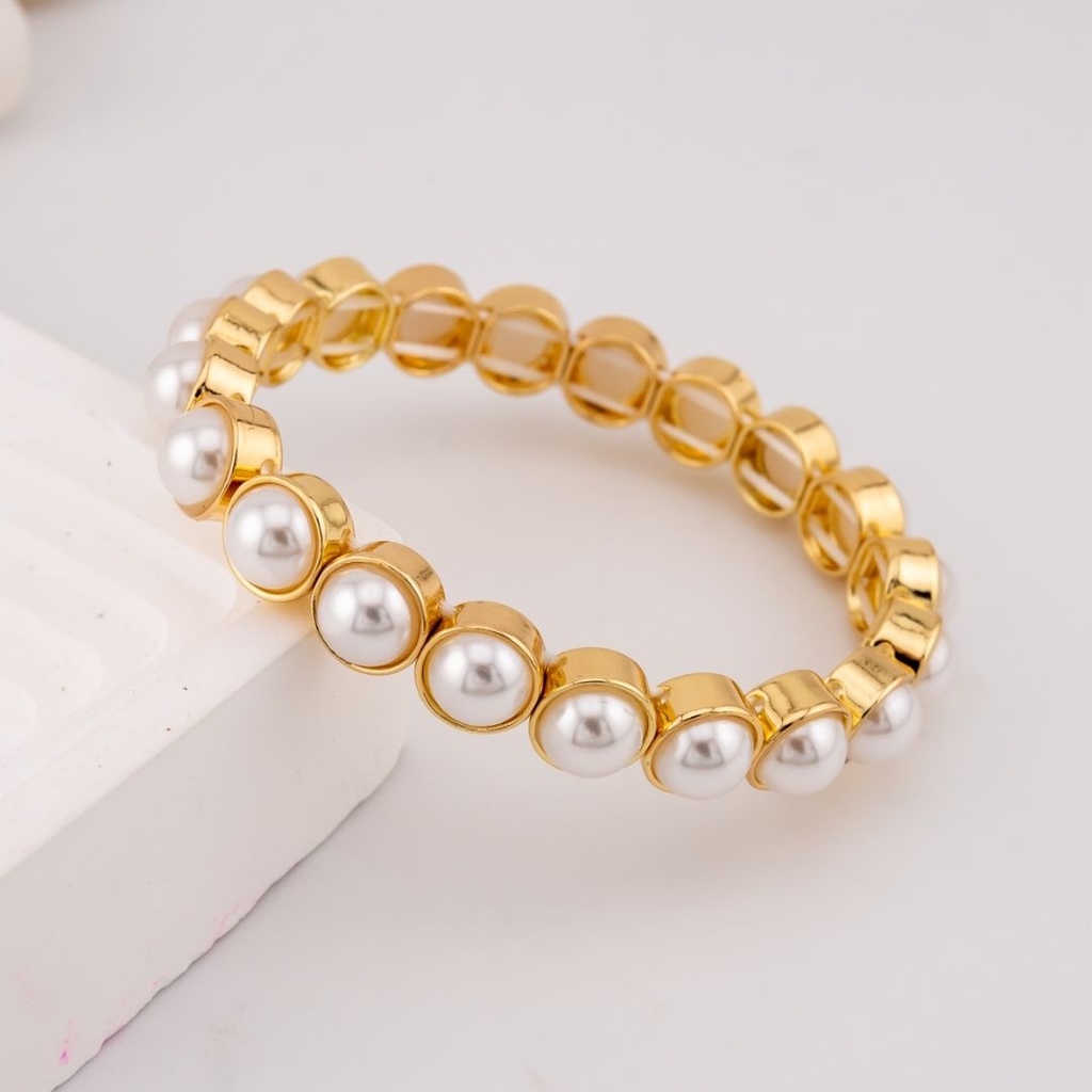 Pusera elastica con perlas baño 18k