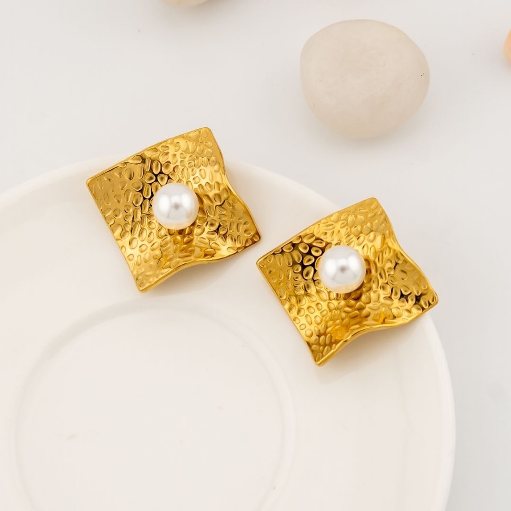 Aretes stud en acero inoxidable con Perla