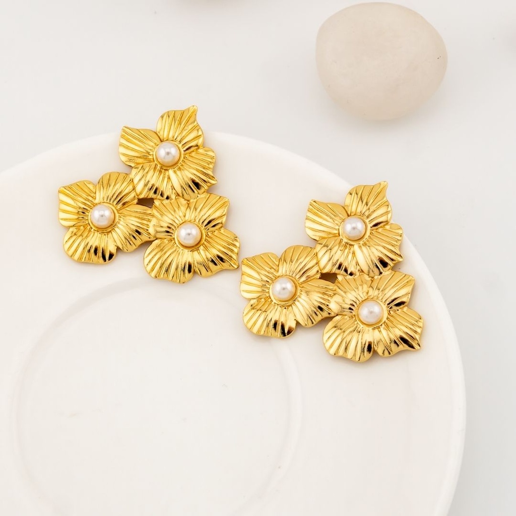 Aretes stud en acero inoxidable con Perla