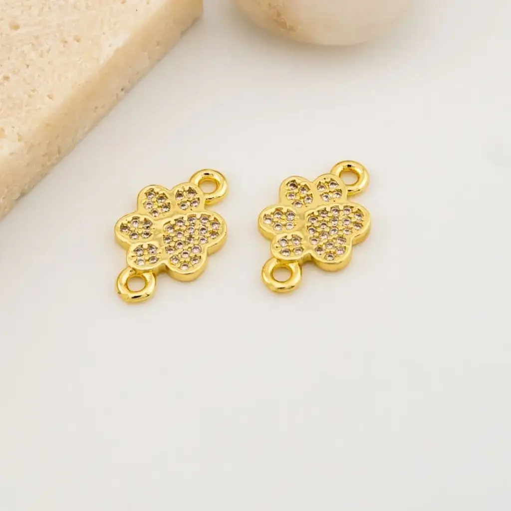 Enlace huella de cachorro con micropave y baño 18k