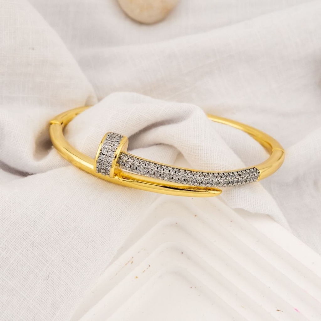 Brazalete clavo dos tonos baño 18k
