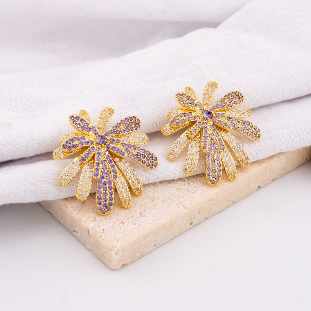 Aretes en forma de destellos con zirconias baño 18k