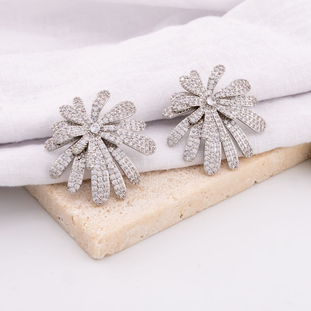 Aretes en forma de destellos con zirconias baño 18k