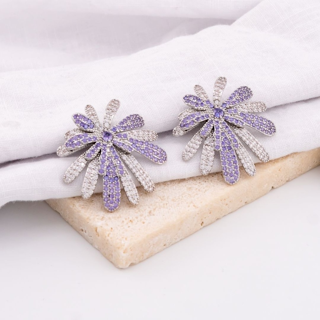 Aretes en forma de destellos con zirconias baño 18k