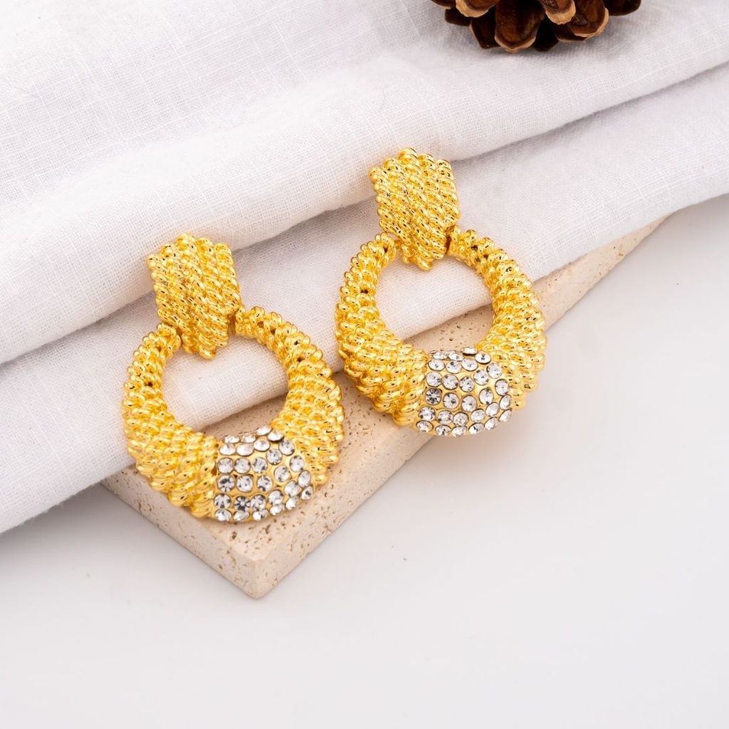 Aretes stud con zirconia  pin de plata baño 18k