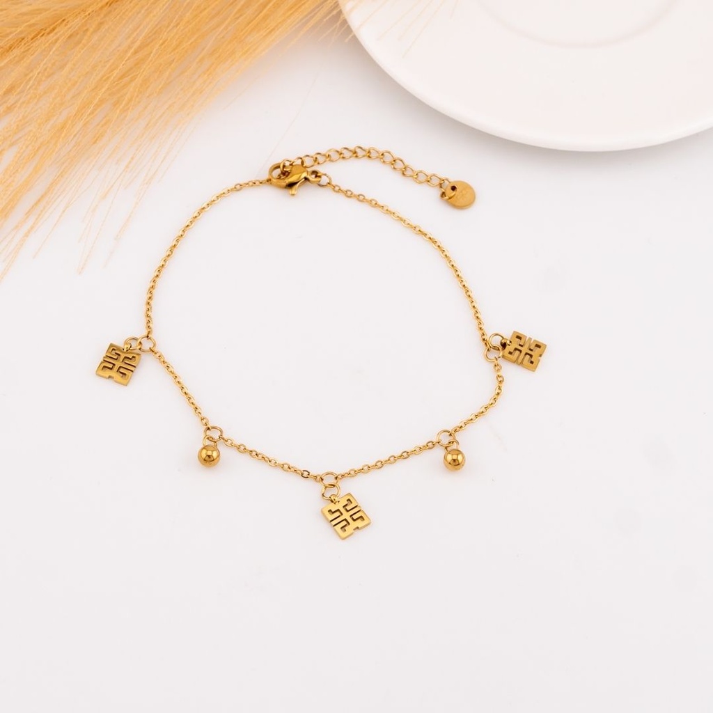 Tobillera con colgantes acero inoxidable