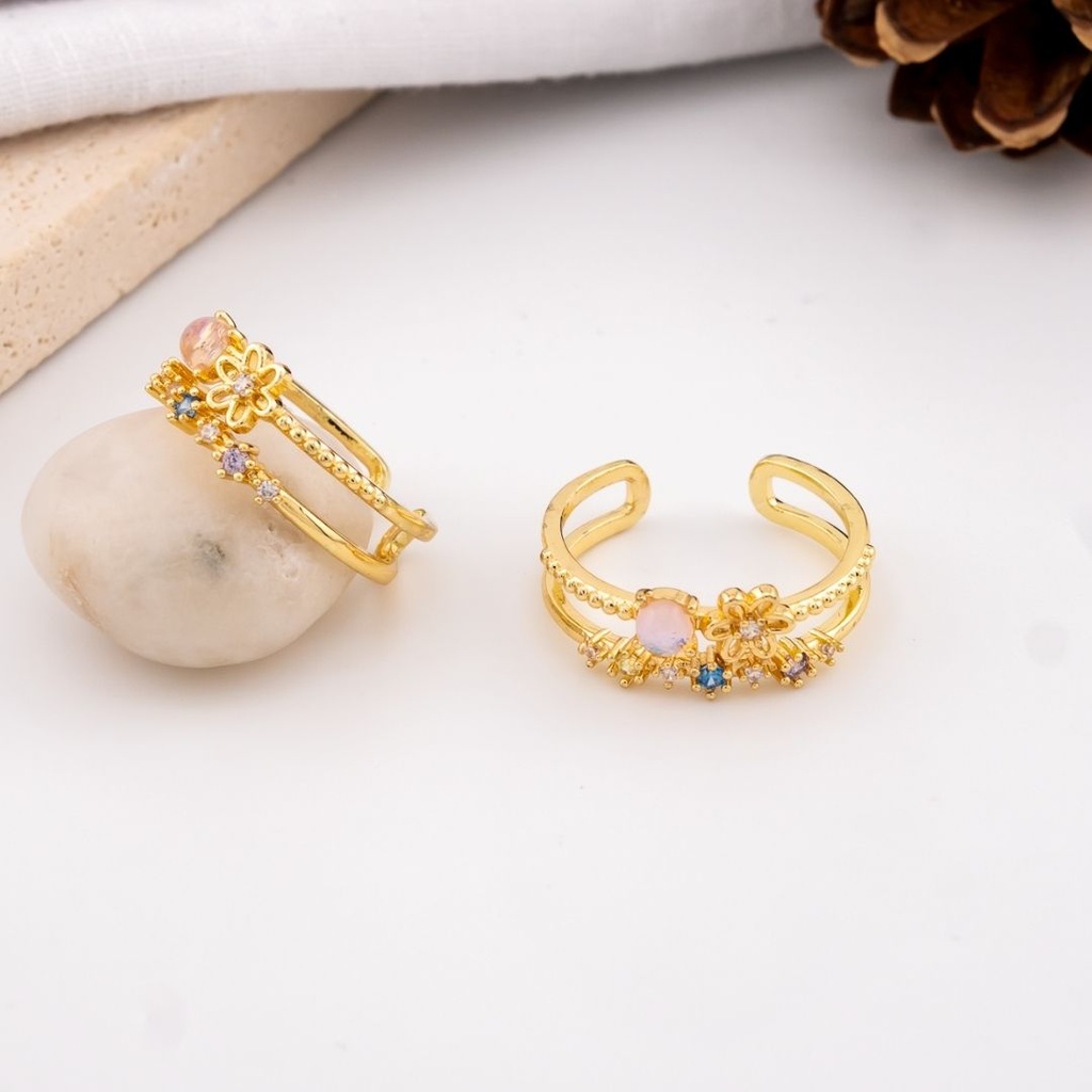 Anillo flor con zirconias  baño 18k