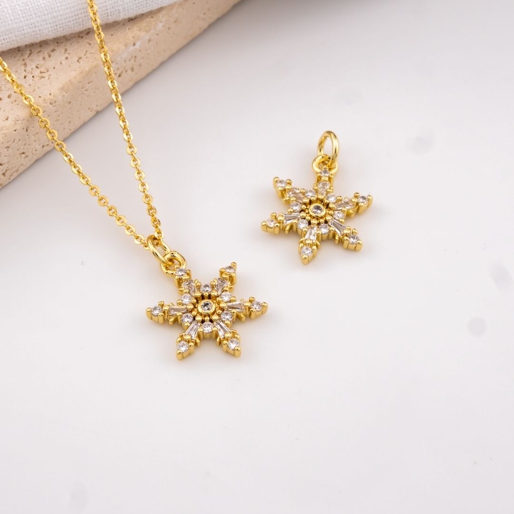 Dije navideño estrella  micropave y baño 18k