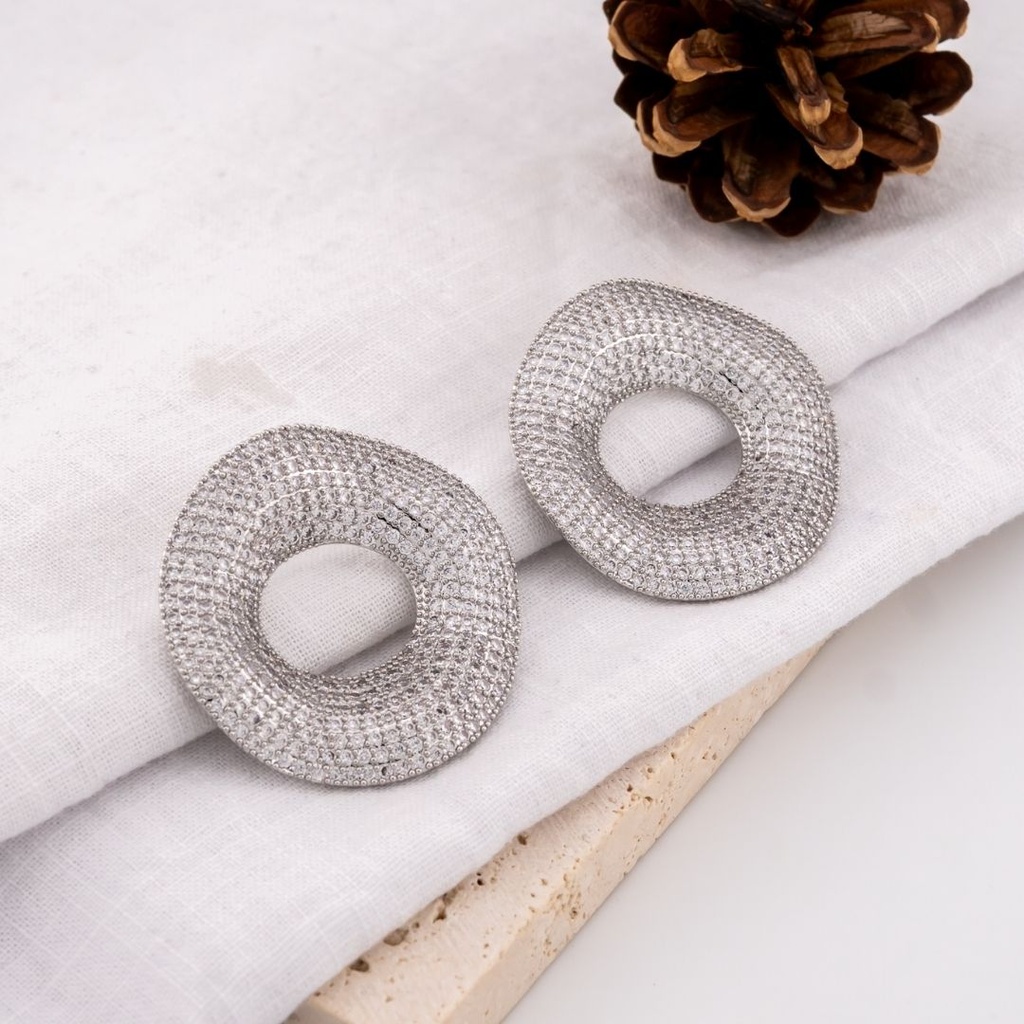 Aretes stud en forma de disco con zirconias pin de plata baño 18k