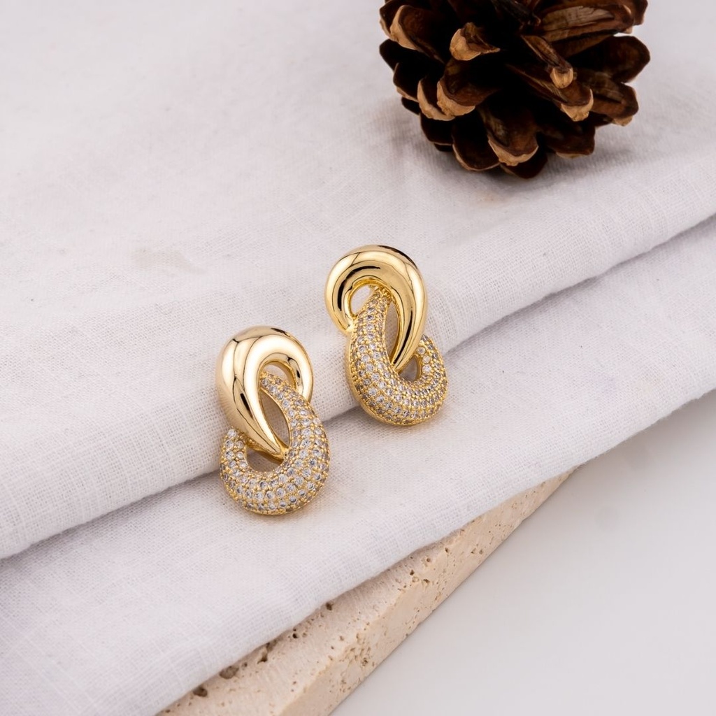 Aretes stud en forma de disco con zirconias pin de plata baño 18k