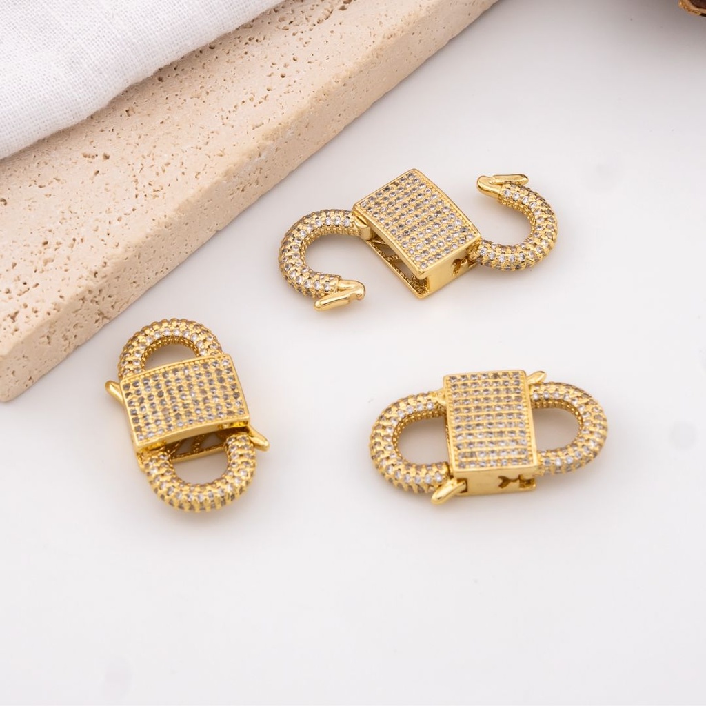 Broche elegante con micropave y baño 18k