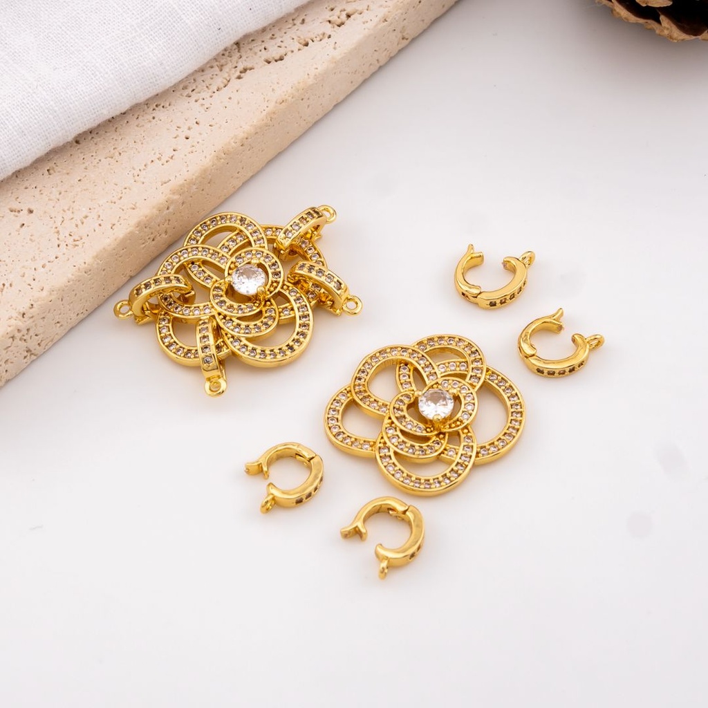Broche elegante 2 hilos con micropave y baño 18k