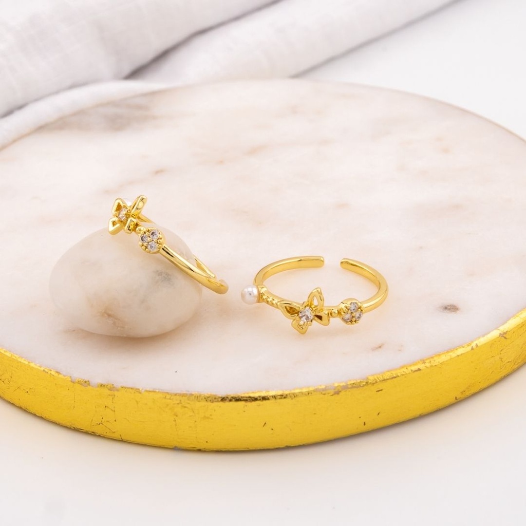 Anillo ajustable mariposa con zirconias baño 18k