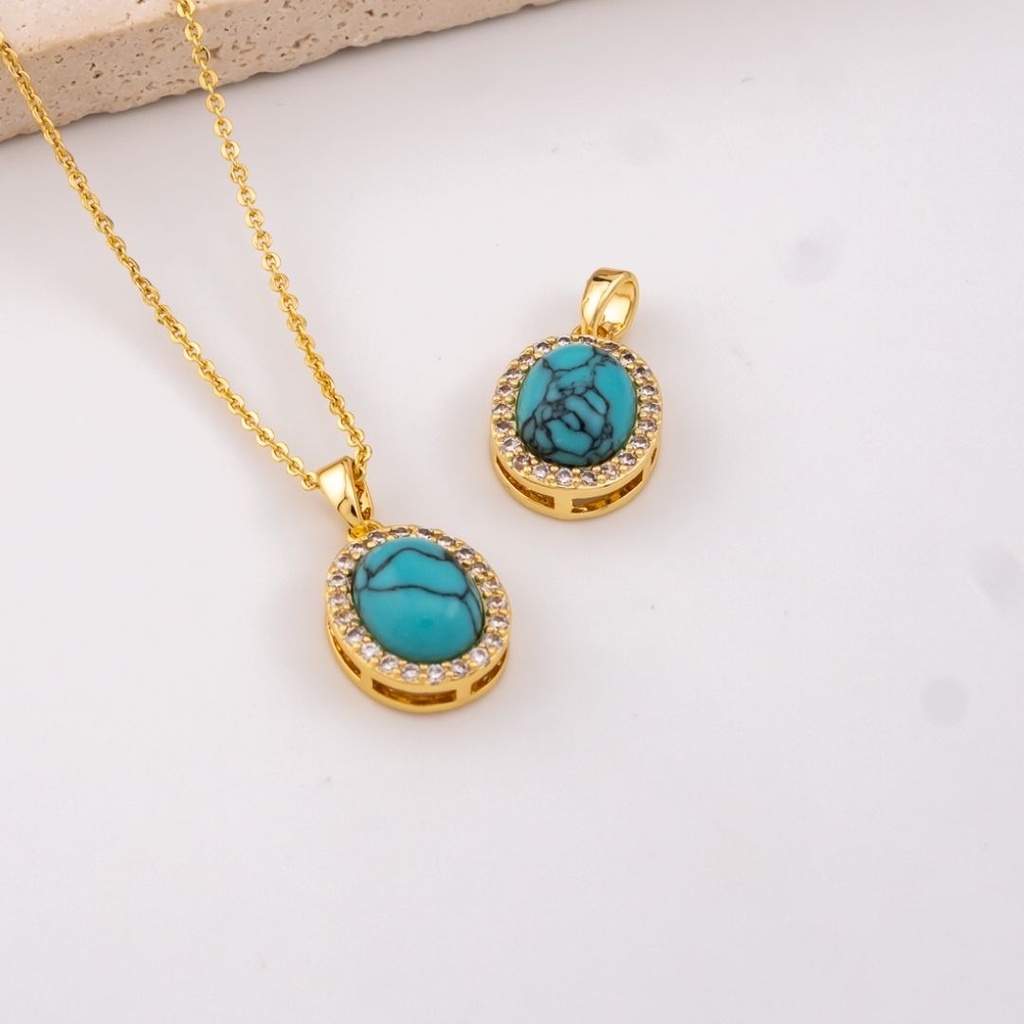 Dije ovalado con turqueza baño 18k