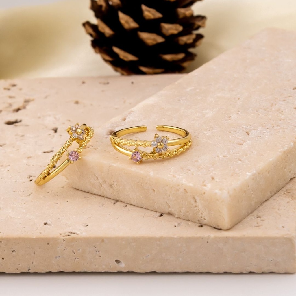 Anillo ajustable de flor con zirconias baño 18k