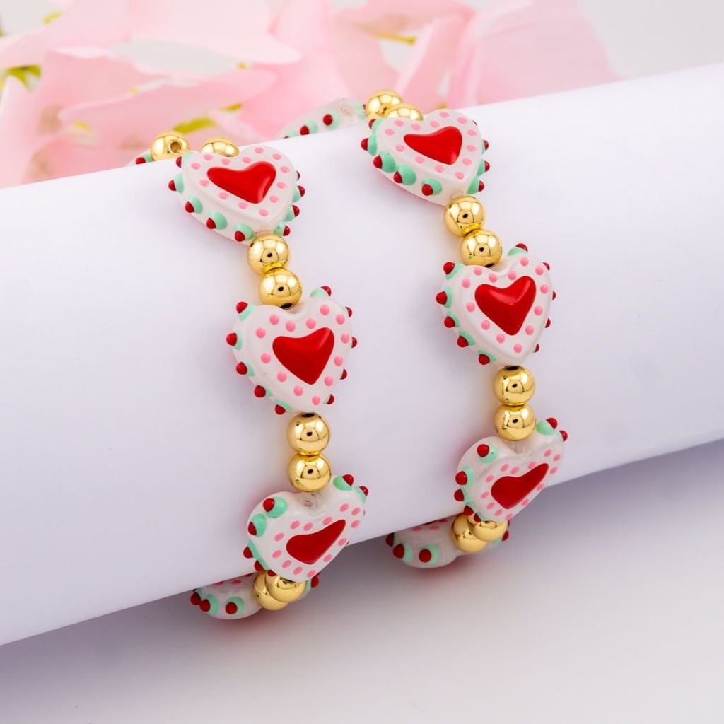 Pulsera elastica de corazones baño 18k 