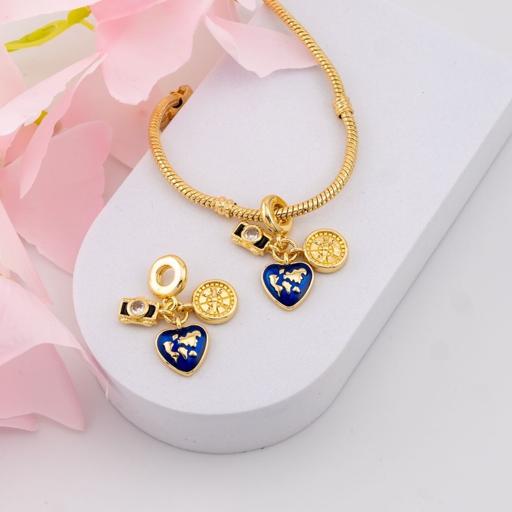 Charm viajero baño 18k