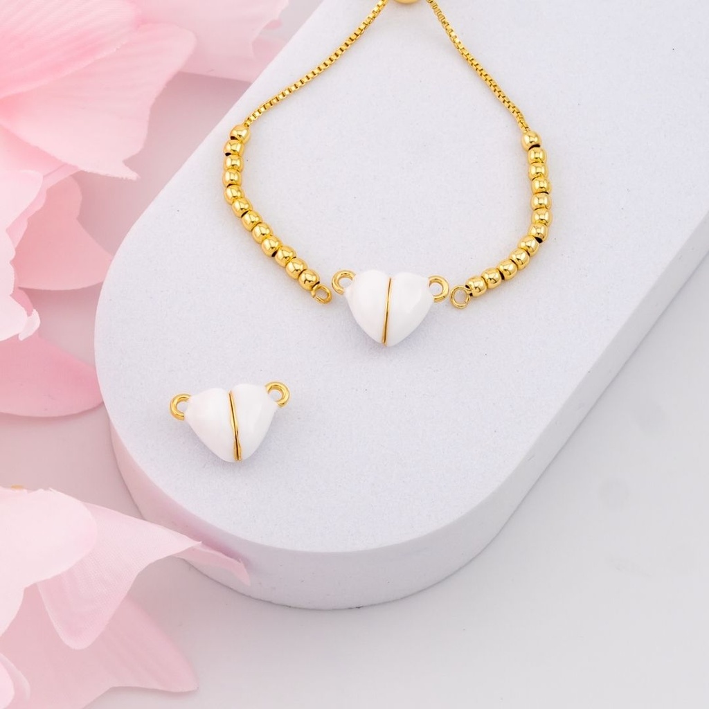 Enlace de corazon con iman baño 18k