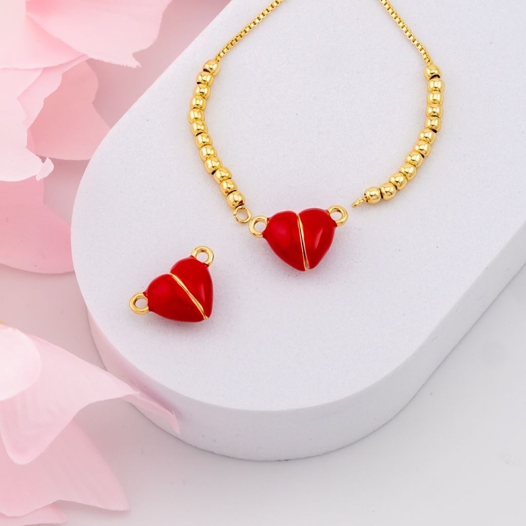 Enlace de corazon con iman baño 18k