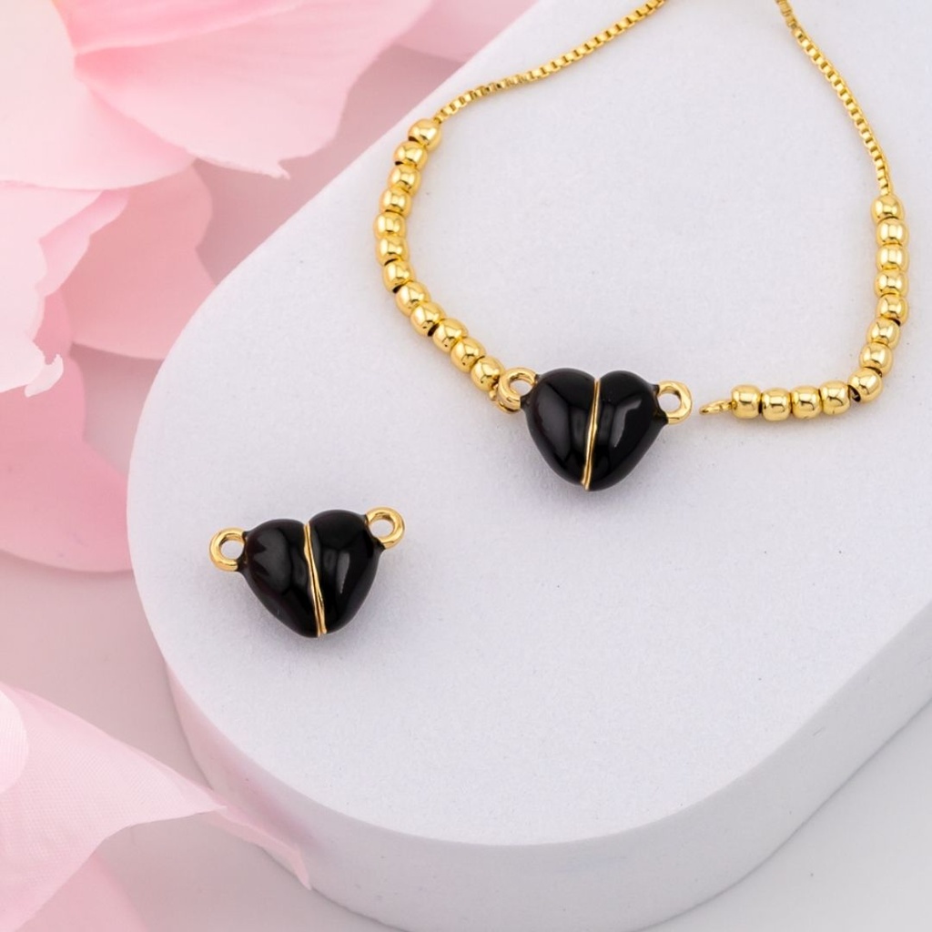 Enlace de corazon con iman baño 18k