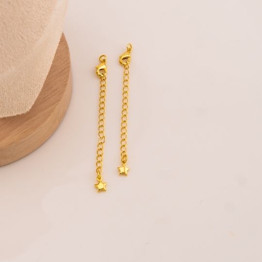 Broche extension con colgante de estrella baño 18k