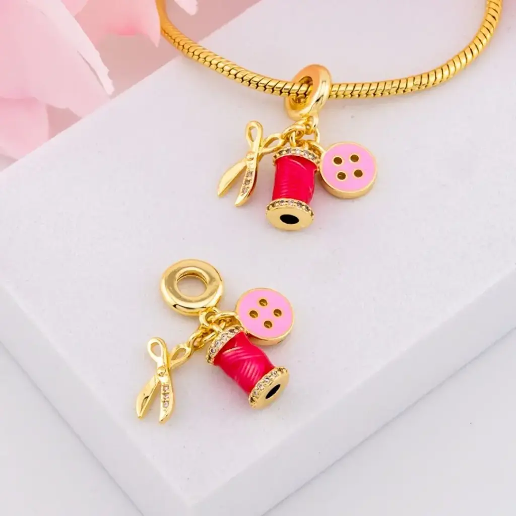 Charm costura baño 18k