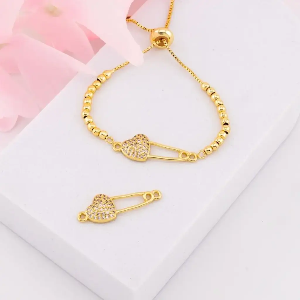 Enlace corazon con zirconias baño 18k