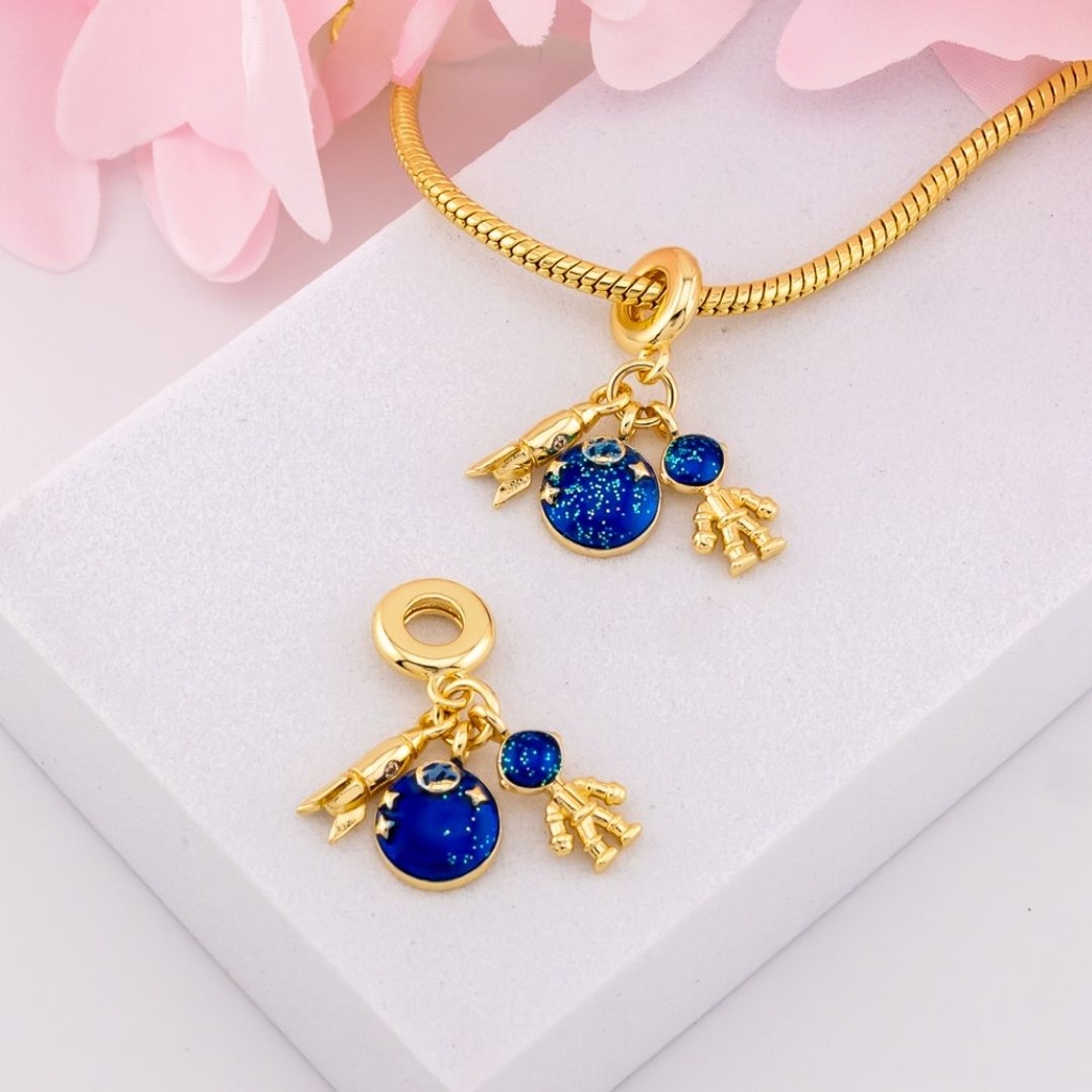 Charm astronauta baño 18k