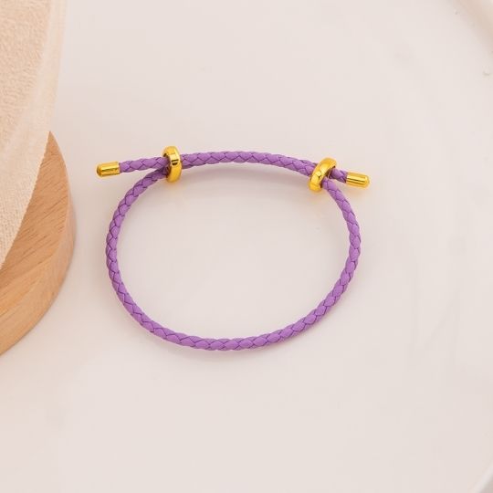 Pulsera moradita de cuero baño 18k