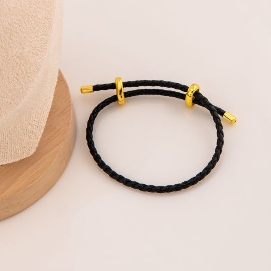 Pulsera negro de cuero baño 18k