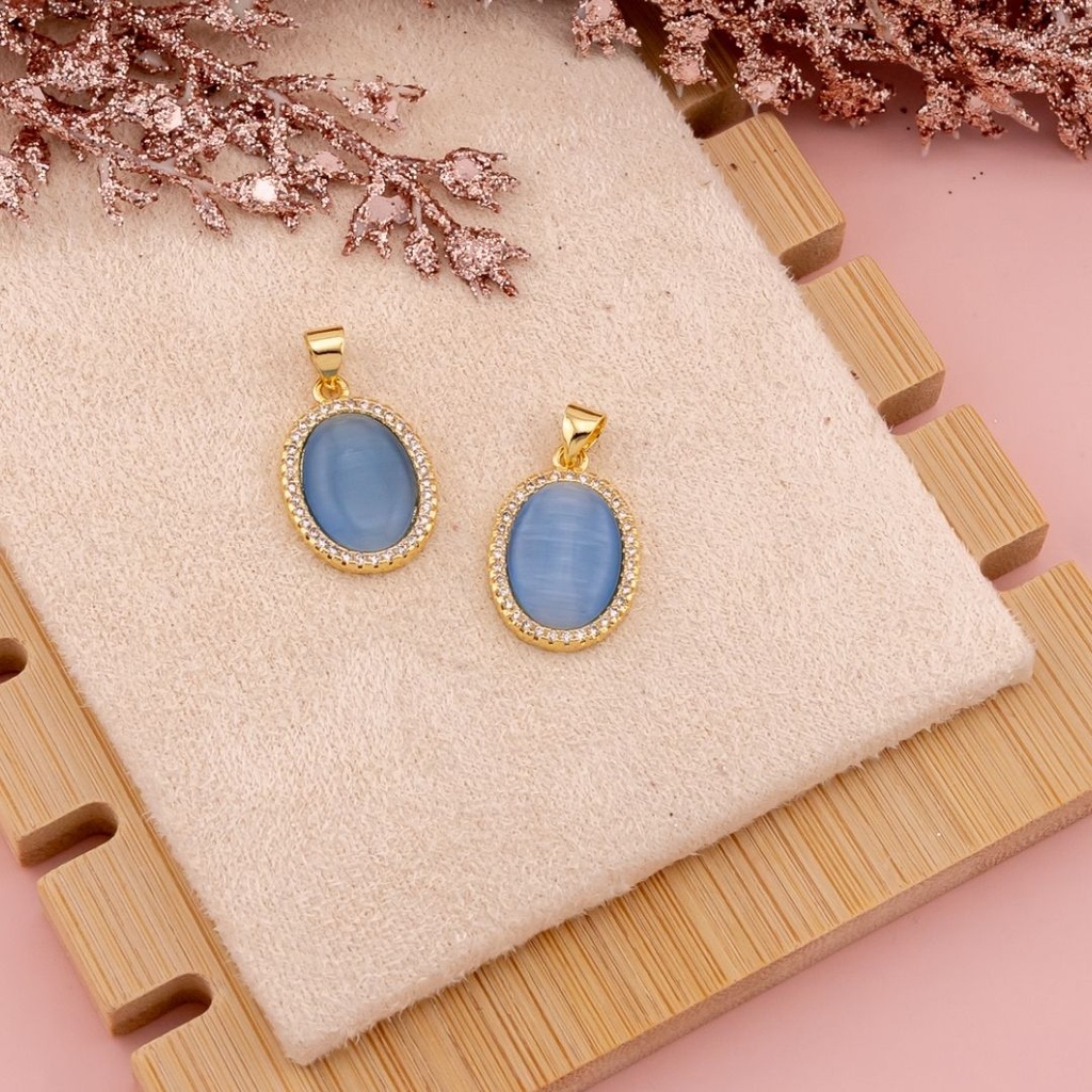 Dije ovalado ojo de gato con zirconias baño 18k