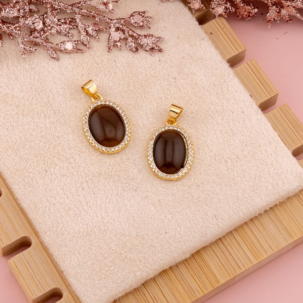 Dije ovalado ojo de gato con zirconias baño 18k