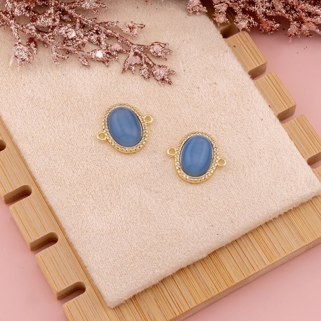 Enlace ovalado ojo de gato con zirconias baño 18k