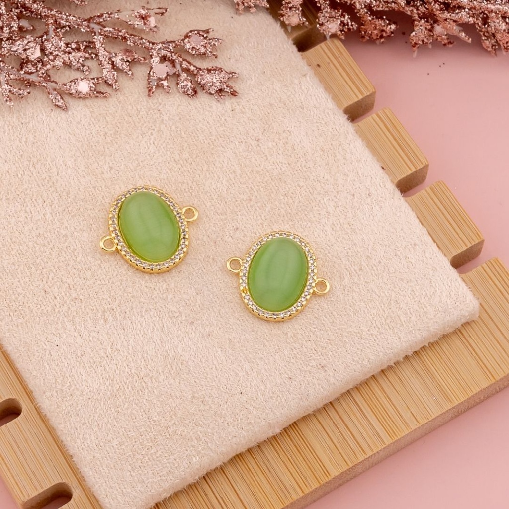 Enlace ovalado ojo de gato con zirconias baño 18k