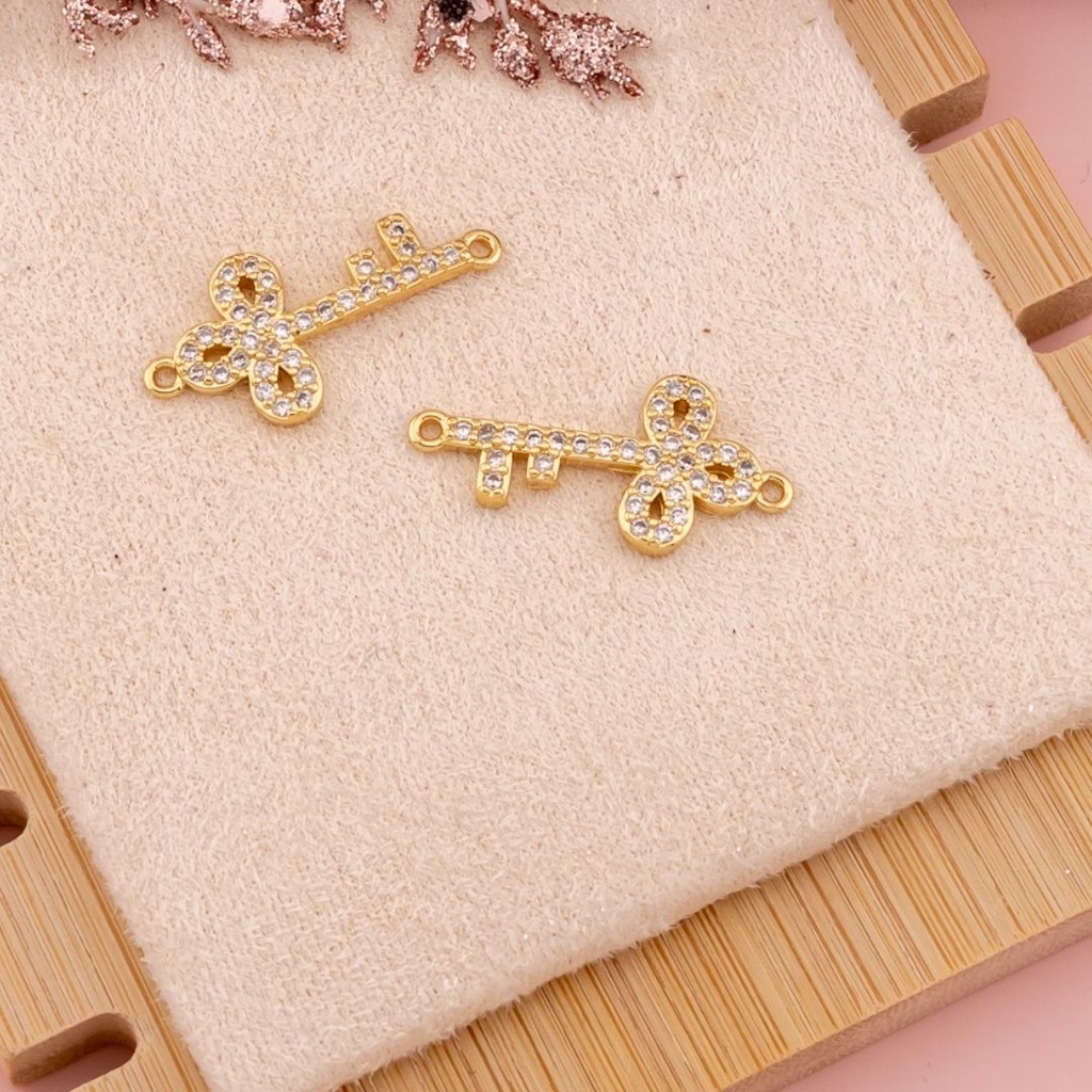 Enlace de llave con zirconias baño 18k