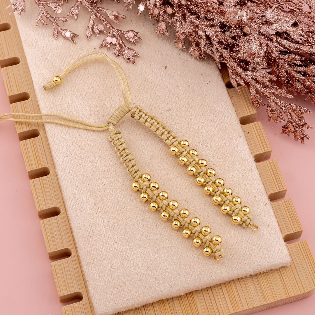 Pulsera ajustable trenzada de hilo con balines baño 18k