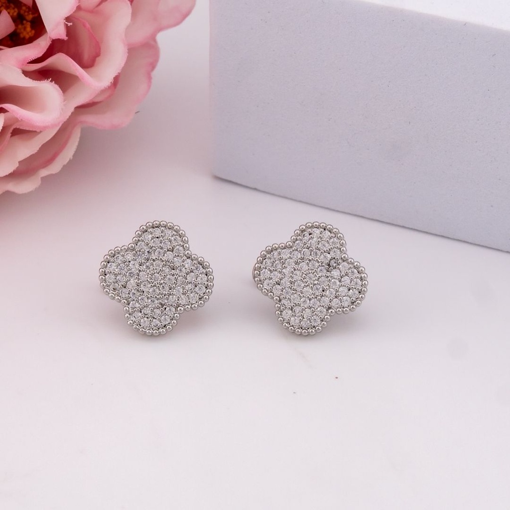 Aretes stud de trebol con zirconias baño 18k
