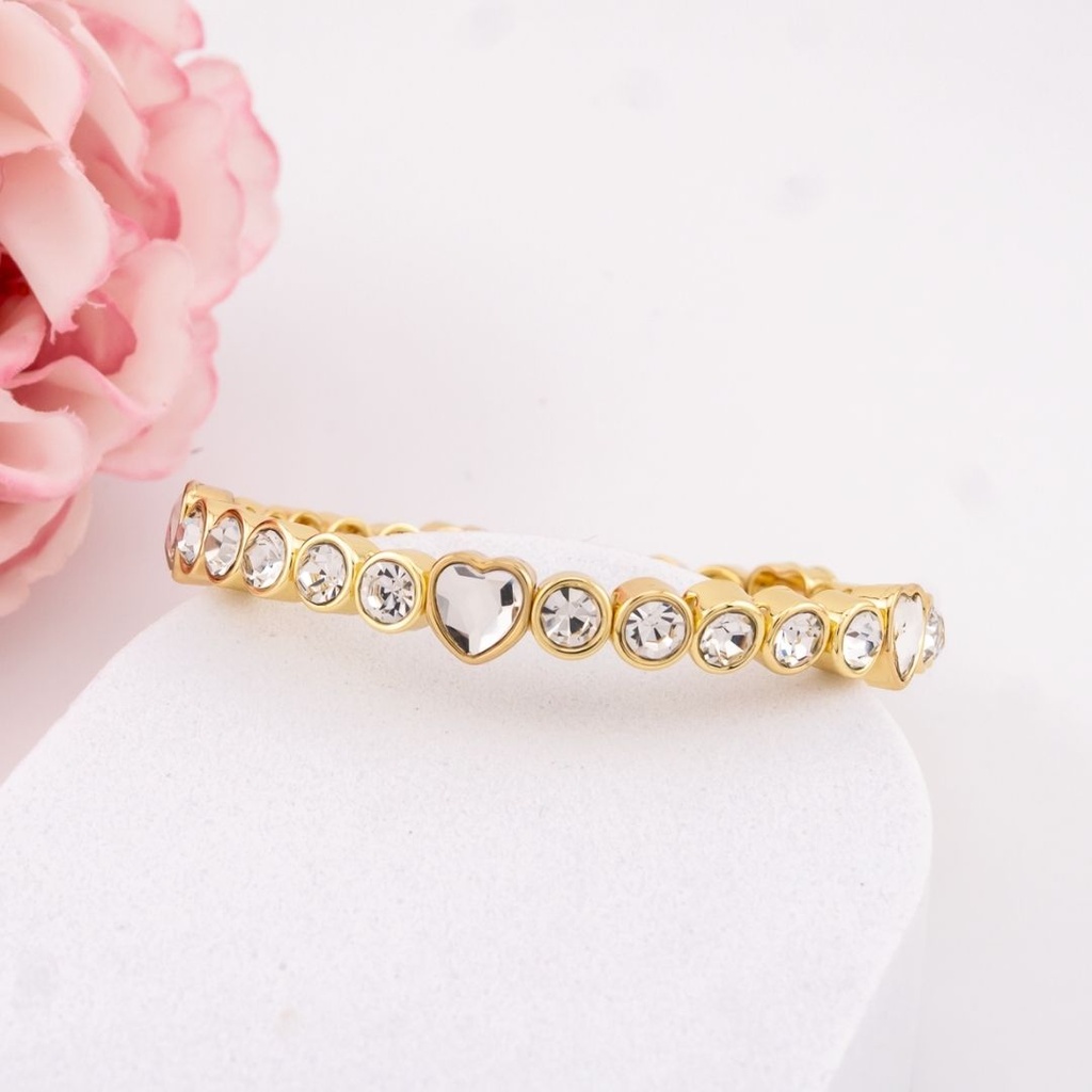 Pulsera elastica con corazones y zirconias baño 18k