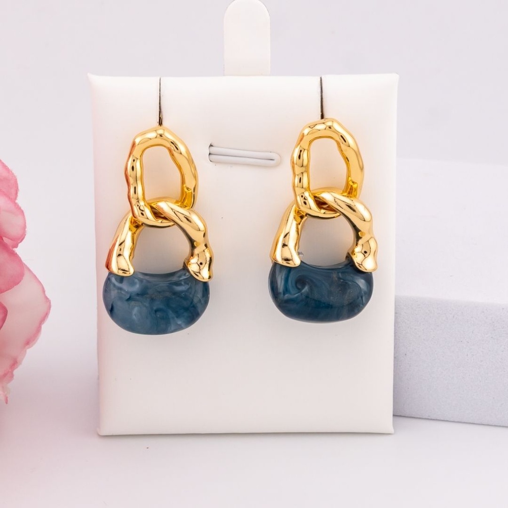 Aretes colgantes de carey baño 18k