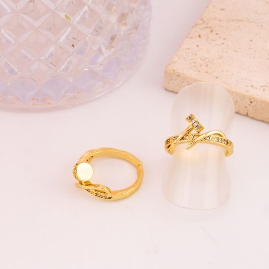 Anillo ajustable de marca con zirconias baño 18k
