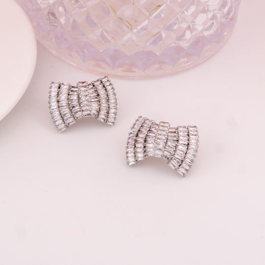 Aretes stud con zirconias baño 18k plat