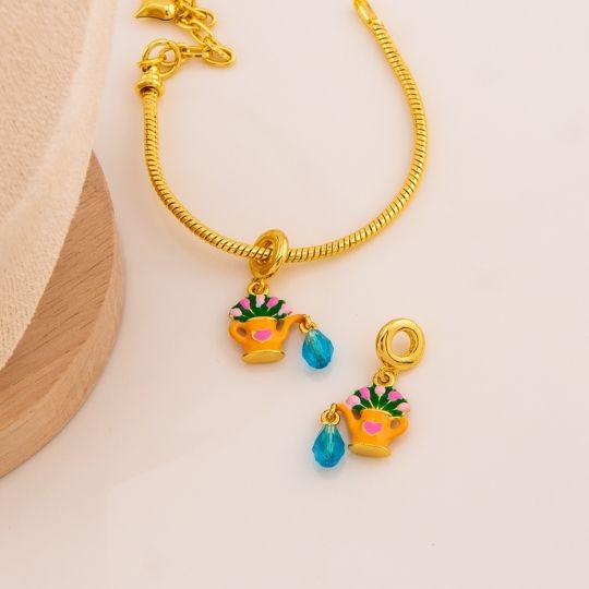 Charm florista baño 18k