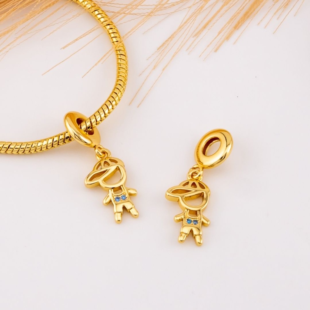 Charm de niño con zirconias baño 18k
