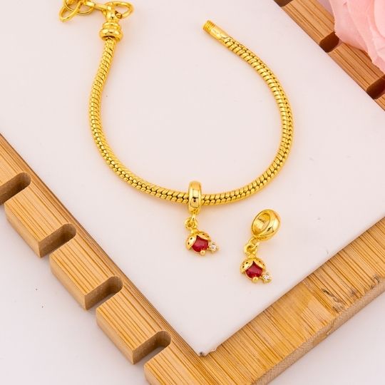 Charm de mariquita baño 18k