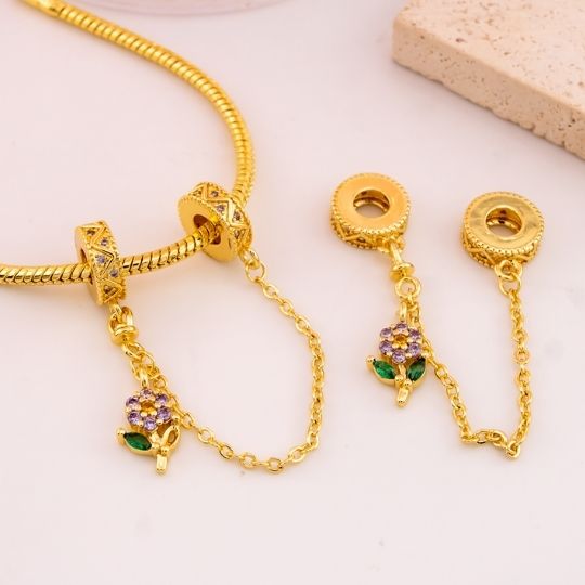 Charm doble de flor con zirconias baño 18k