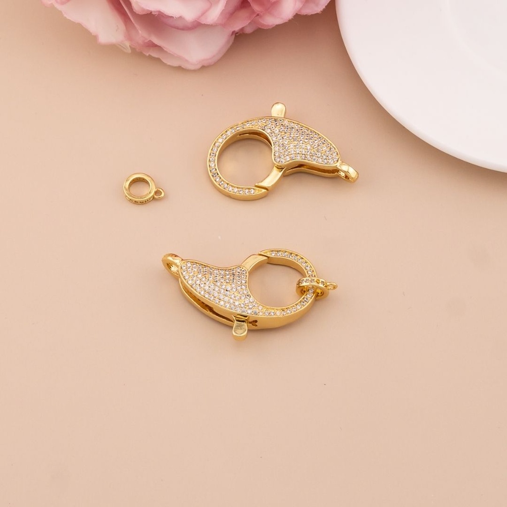 Broche con zirconias baño 18k