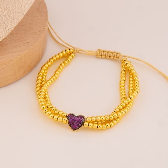 Pulsera ajutable de corazon con zirconias baño 18k