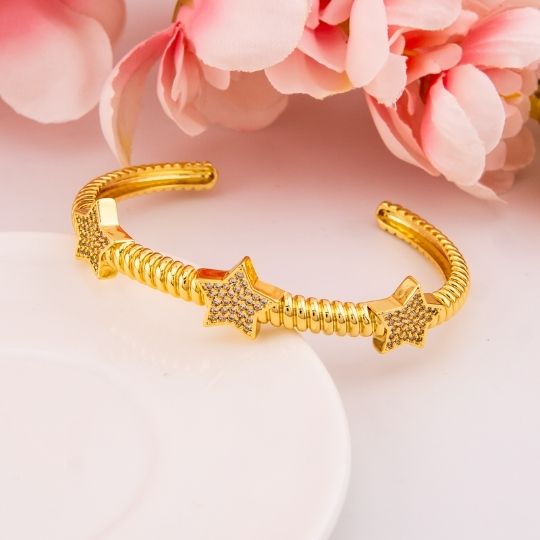 Brazalete de estrella con zirconias baño 18k